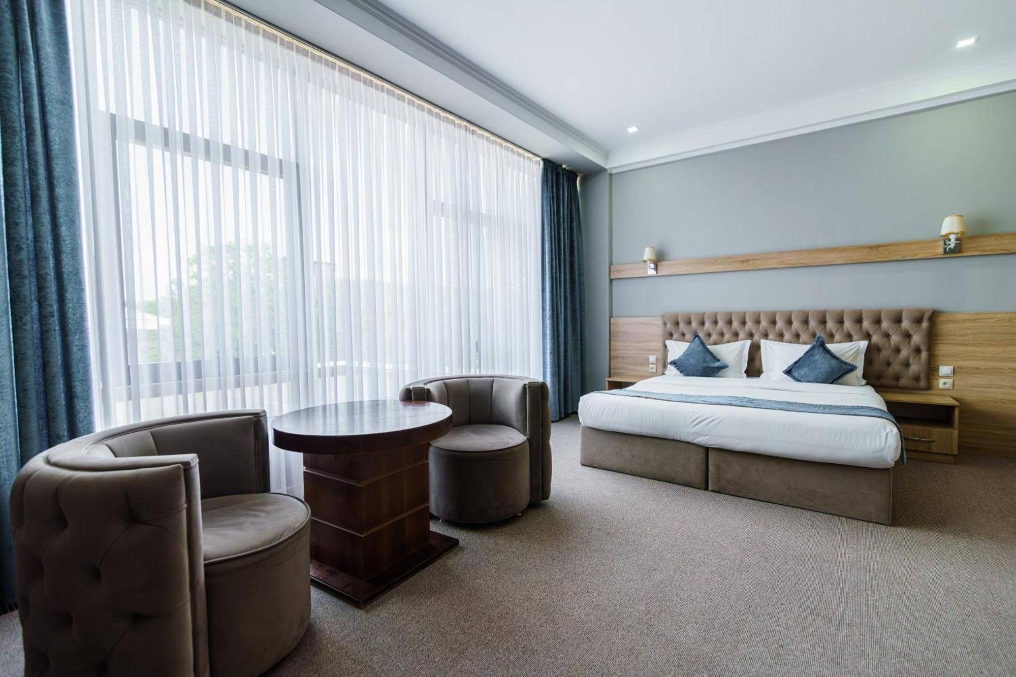 Park Hotel Al Bustan Шымкент Экстерьер фото