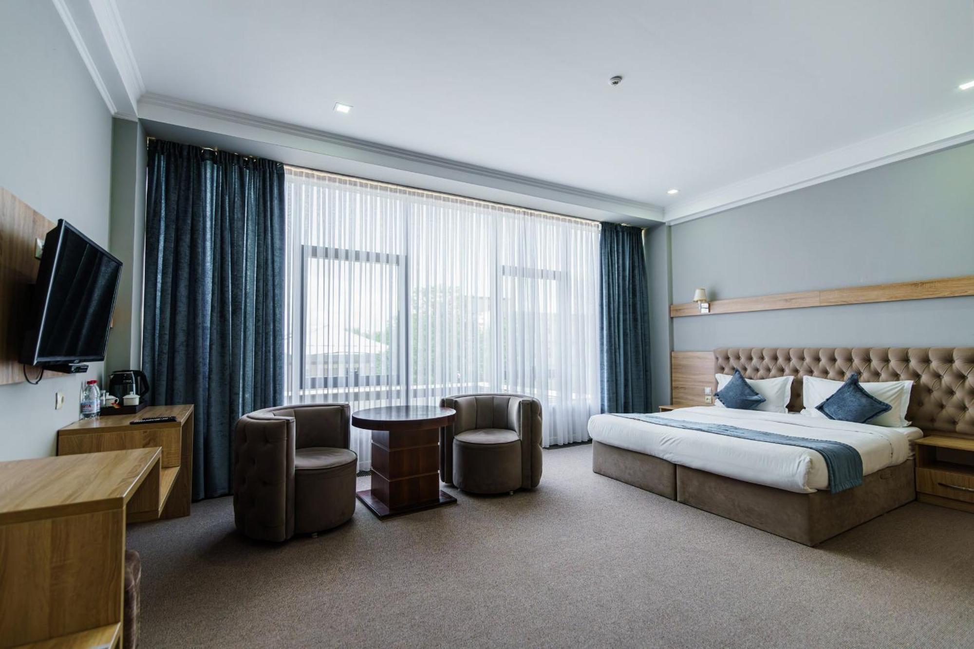 Park Hotel Al Bustan Шымкент Экстерьер фото